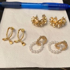 Earrings.  Three pairs